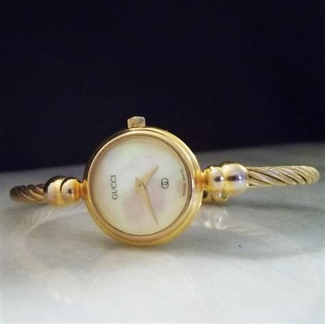 gold gucci watch with mother of pearl face|gucci watches for women.